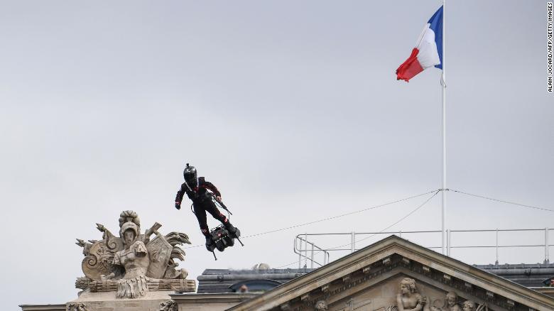Zapata CEO Franky Zapata flies his jet-powered &quot;Flyboard&quot; over Bastille Day celebrations. 