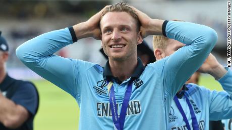 England's Jos Buttler celebrates on the pitch.