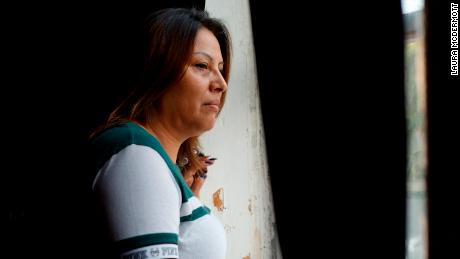 Francisca Lino looks out onto the street outside Adalberto United Methodist Church in Chicago on July 13.