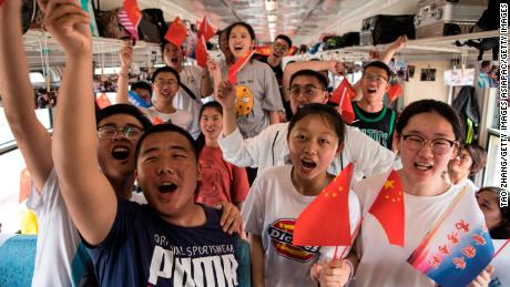 Students board a &quot;gaokao train&quot; at Dayangshu township on June 5 in the Inner Mongolia Autonomous Region, China.