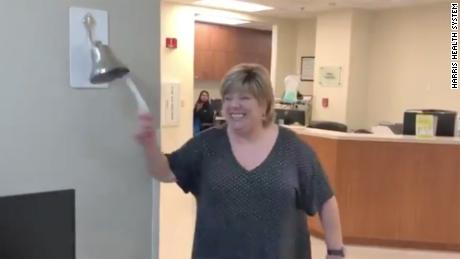 Darla Jaye was first diagnosed with breast cancer in February, and broke this bell on her last day of treatment. 