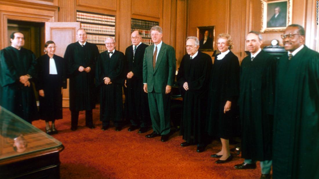 President Bill Clinton poses with members of the Supreme Court in Washington on October 1, 1993. From left are Antonin Scalia, Ruth Bader Ginsburg, Anthony Kennedy, Stevens, Chief Justice William Rehnquist, Clinton, Harry Blackmun, Sandra Day O&#39;Connor, David Souter and Clarence Thomas.