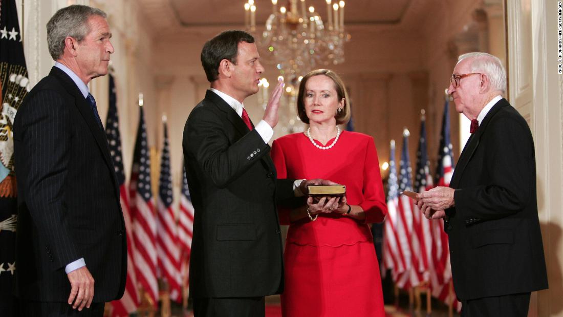 Judge John Roberts, second left, is sworn in as US Supreme Court Chief Justice on September 29, 2005, at the White House by Stevens, right, before his wife, Jane, second right, and President George W. Bush.