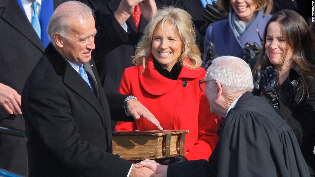 Former Vice President Joe Biden shakes hands with Stevens after taking the oath of office on January 20, 2009. Biden&#39;s wife, Jill, is at his side.