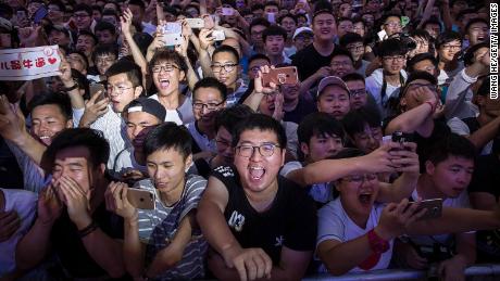 Fans cheering at the Douyu festival in Wuhan, China in 2017.