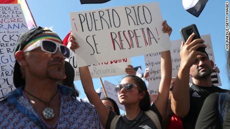 Crowds gathered outside Puerto Rico&#39;s Capitol and walked to the governor&#39;s mansion.