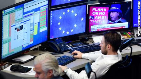 FRANKFURT AM MAIN, GERMANY - JANUARY 16: A trader looks at his computer screens at the Frankfurt Stock Exchange the day after a large majority of MPs in the British House of Commons rejected British Prime Minister Theresa May&#39;s Brexit deal on January 16, 2019 in Frankfurt, Germany. The government suffered a historic defeat in the House of Commons last night as MPs voted 432 to 202 to reject Theresa May&#39;s Brexit Deal. Labour Leader Jeremy Corbyn immediately tabled a motion of no confidence in the government that will be debated and voted on later today. (Photo by Thomas Lohnes/Getty Images)