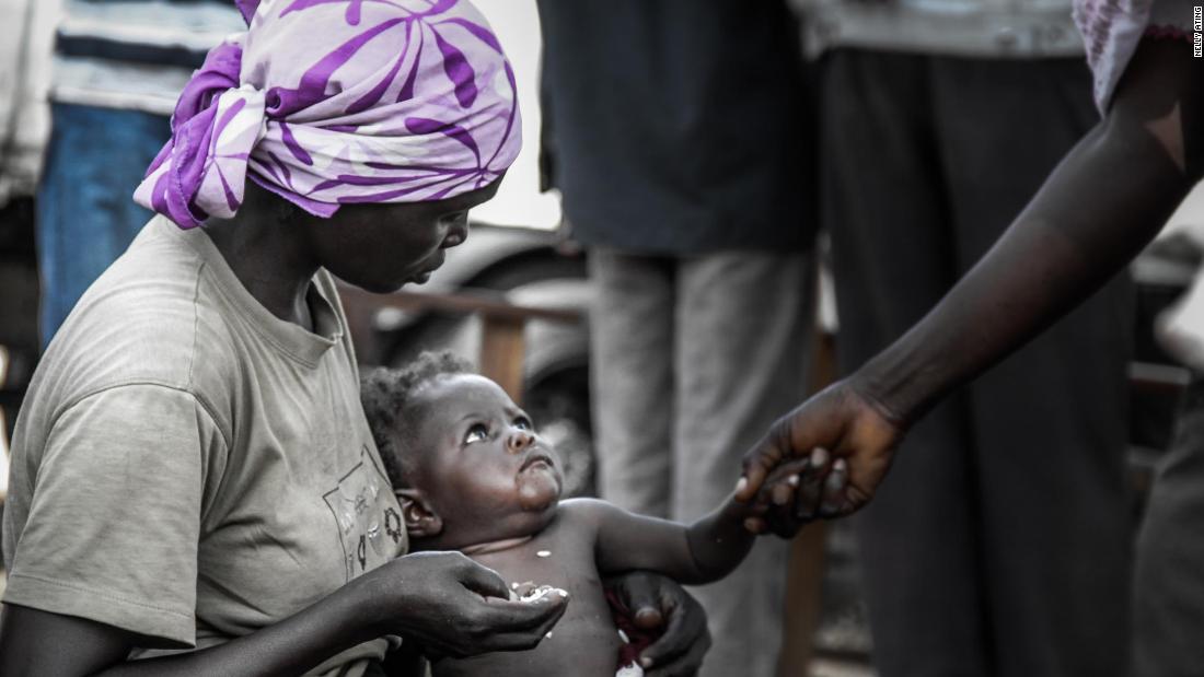 A woman and her traumatized baby. She crossed over to Cameroon and walked hrough the bush surviving only on raw corn and dirty water.