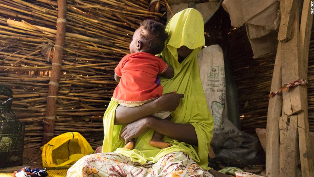 Hadiza, 20, "When Banki was raided, my husband was trying to escape. He was arrested by the Boko Haram and forced to join. He later tried to run from the group, he was caught and killed. I met another man (IDP) and together we have an eight months old baby girl." Maiduguri, 2018