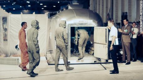 Carpentier, far left, goes into quarantine with the Apollo 11 astronauts.