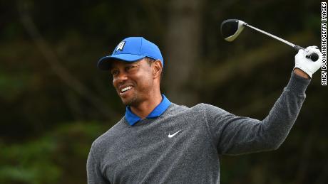 Tiger Woods was hampered by his ailing back on day one of the Open at Royal Portrush.