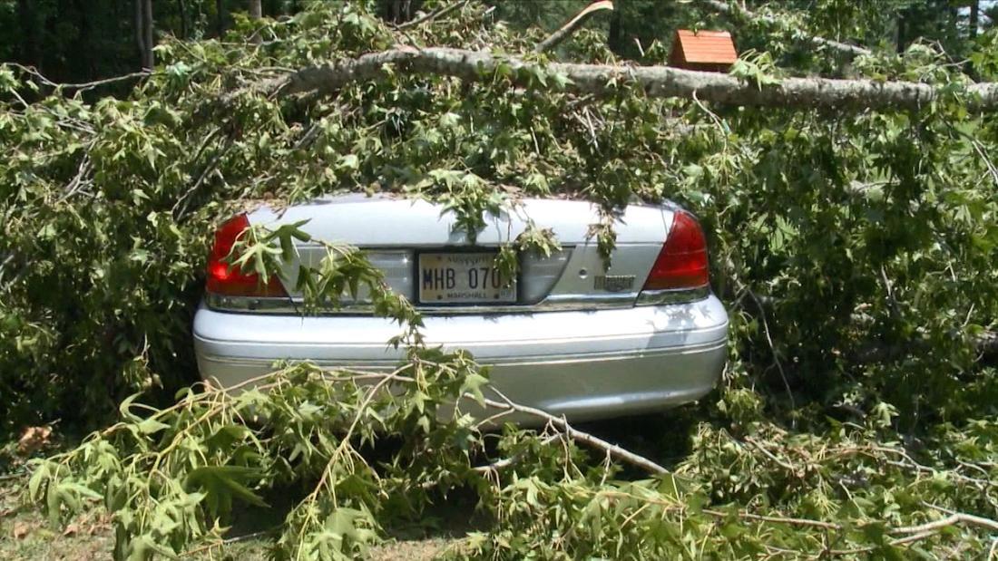 Tree crashes down while man runs from tornado closing in - CNN Video