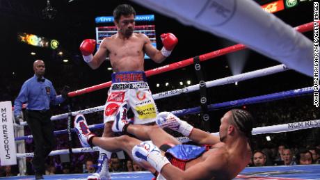 Manny Pacquiao beat Keith Thurman in the WBA welterweight title fight Saturday, flooring the American in the first round. 