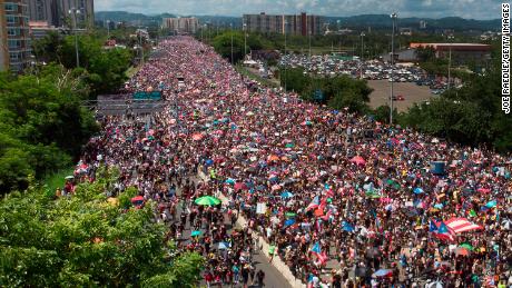 An aerial view from a drone shows thousands of people as they fill the Expreso Las Américas highway in San Juan.