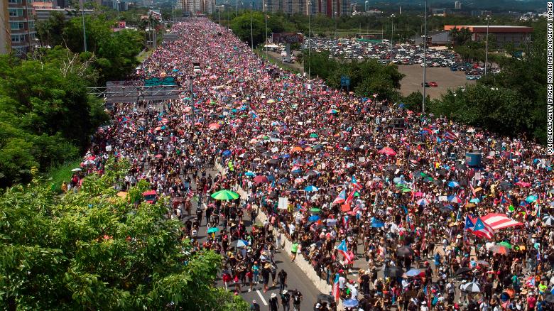 An aerial view from a drone shows thousands of people as they fill the Expreso Las Américas highway calling for the ouster of Gov. Ricardo A. Rosselló.