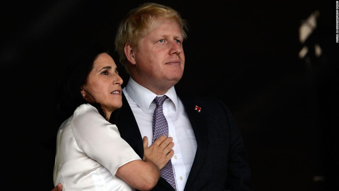 Johnson and his wife, Marina, enjoy the atmosphere in London ahead of the Olympic opening ceremony in July 2012. The couple separated in 2018 after 25 years of marriage. 