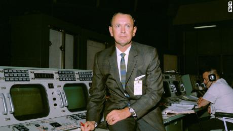 Kraft seen at his flight director console in the Mission Control Center during Gemini-Titan V flight simulation.