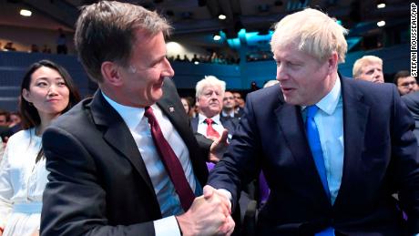 Jeremy Hunt (left) congratulates Boris Johnson after the announcement of the result on July 23.