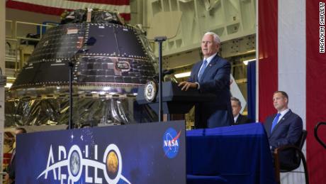 Vice President Mike Pence at Kennedy Space Center on the Apollo 11 anniversary, next to the completed Orion crew capsule.