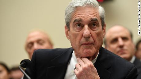 Former Special Prosecutor Robert Mueller listens while testifying before Congress. 