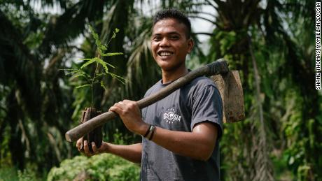 A tree planter working in association with Ecosia in Indonesia.