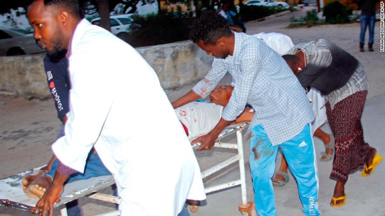 Medical workers help a civilian who was wounded in a suicide bombing in Mogadishu, Somalia, on Wednesday.