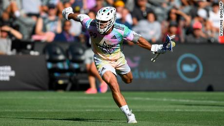 Team Baptiste&#39;s Paul Rabil carries the ball in the Premier Lacrosse League All-Star game.