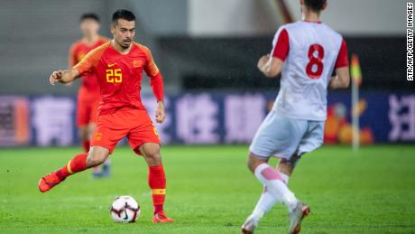 China's Nico Yennaris (left), known as Li Ke in Chinese, plays in friendly match in Guangzhou, in China's southern Guangdong province on June 11, 2019. 