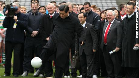 Xi Jinping, then the Chinese vice-president, kicks a football in Dublin, in February 2012.