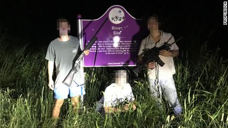 3 college students posed with guns by the Emmett Till memorial. The Justice Department may investigate