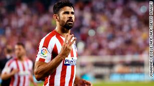 Atletico Madrid's Diego Costa celebrates after scoring his third goal.