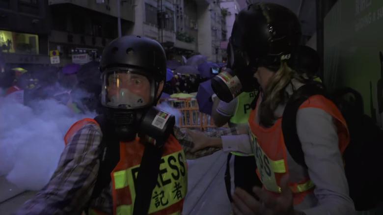 CNN reporter and crew hit by tear gas in Hong Kong