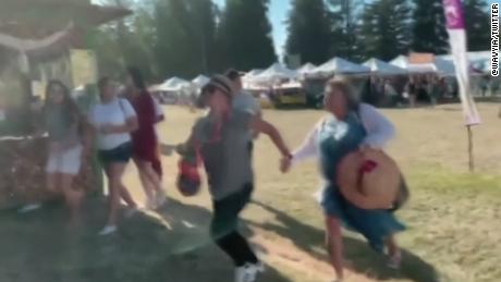 A screengrab taken from video and uploaded to twitter appears to show people scrambling at the Gilroy Garlic Festival