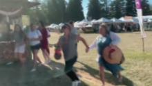 A screengrab taken from video and uploaded to twitter appears to show people scrambling at the Gilroy Garlic Festival