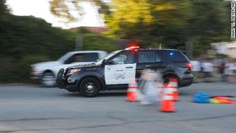 Emergency vehicles head towards the Gilroy Garlic Festival following a shooting in Gilroy, Calif., on Sunday, July 28, 2019. (Nhat V. Meyer/San Jose Mercury News via AP)