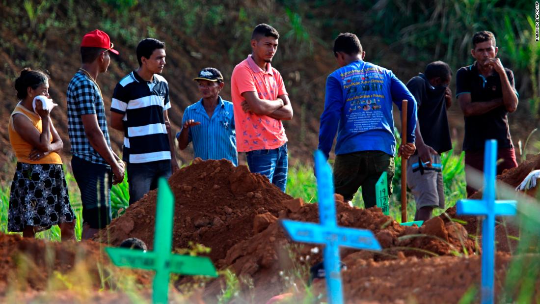 Family members attend the funeral of a prisoner who was killed during the riot in Altamaria.