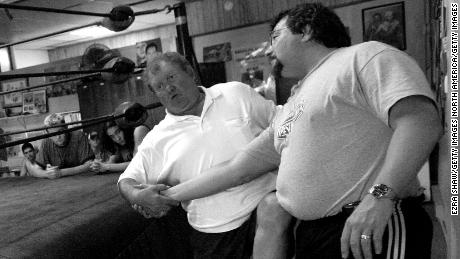 Harley Race demonstrates a move at his wrestling school in 2006. 