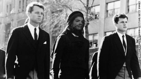 Robert Kennedy and Edward Kennedy with their sister-in-law Jacqueline Kennedy during the funeral of President John F.  Kennedy. 