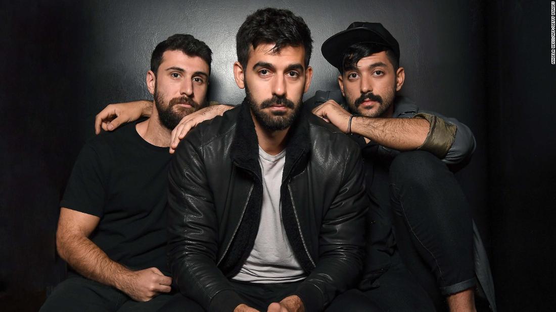 Musicians Haig Papazian, Carl Gerges and Hamed Sinno of Mashrou' Leila pose for a picture on November 1, 2017 in New York.