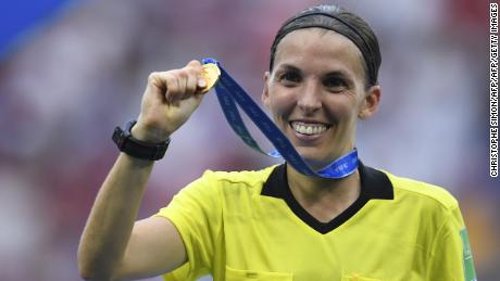 TOPSHOT - French referee Stephanie Frappart shows her medal after the France 2019 Womens World Cup football final match between USA and the Netherlands, on July 7, 2019, at the Lyon Stadium in Lyon, central-eastern France. (Photo by CHRISTOPHE SIMON / AFP)        (Photo credit should read CHRISTOPHE SIMON/AFP/Getty Images)