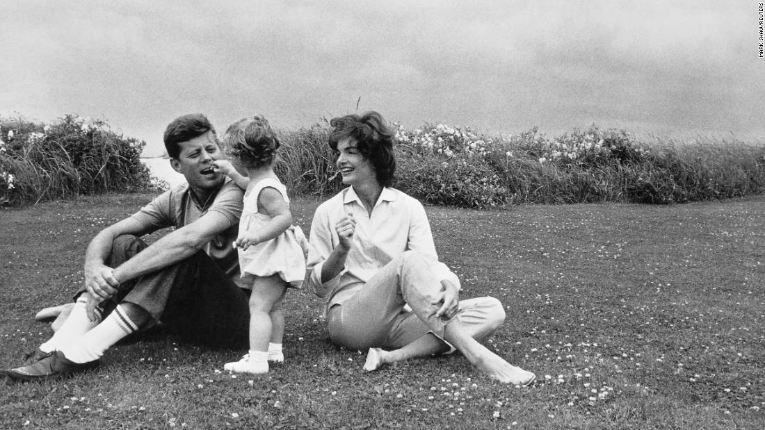 John and Jackie Kennedy play with their daughter, Caroline, in 1959. He was elected President one year later.