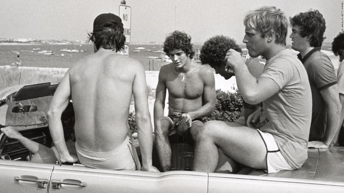 John Jr., second from left, hangs out with friends in Hyannis Port in 1980.