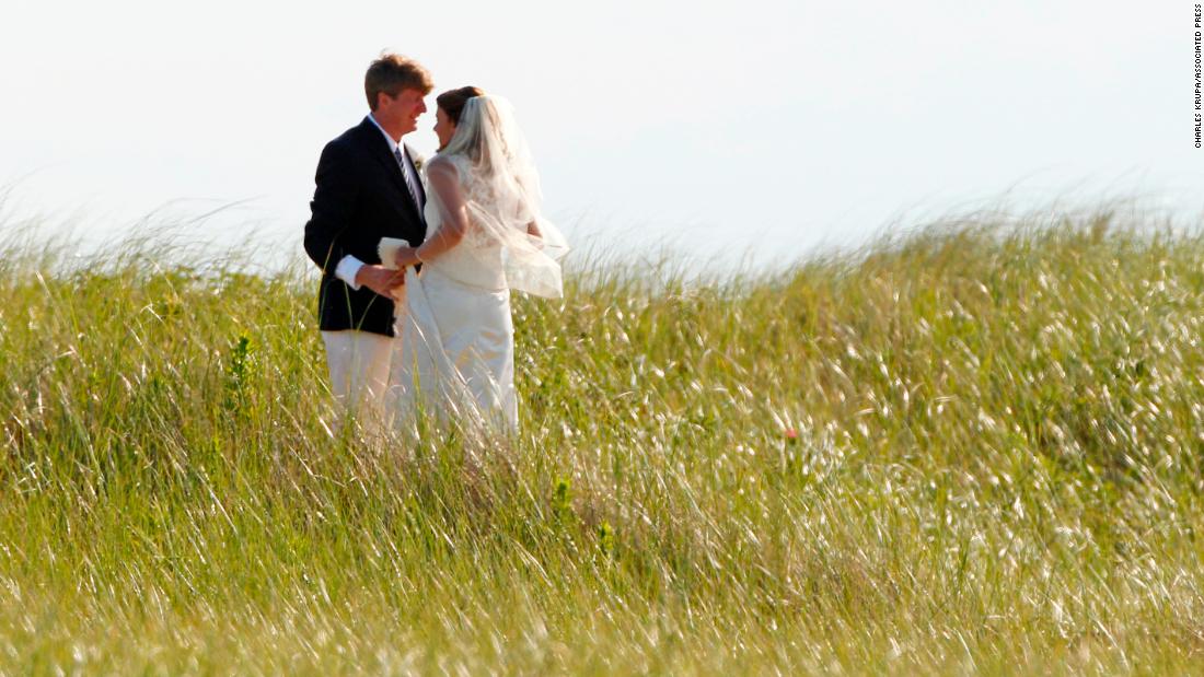 Former US Rep. Patrick Kennedy, one of Ted&#39;s sons, walks with his wife, Amy, after their wedding in Hyannis Port in 2011.