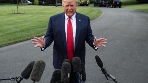 US President Donald Trump speaks to the press at the White House as he departs for Cincinnati to hold a campaign rally in Washington, DC, on August 1, 2019. (Photo by NICHOLAS KAMM / AFP)        (Photo credit should read NICHOLAS KAMM/AFP/Getty Images)