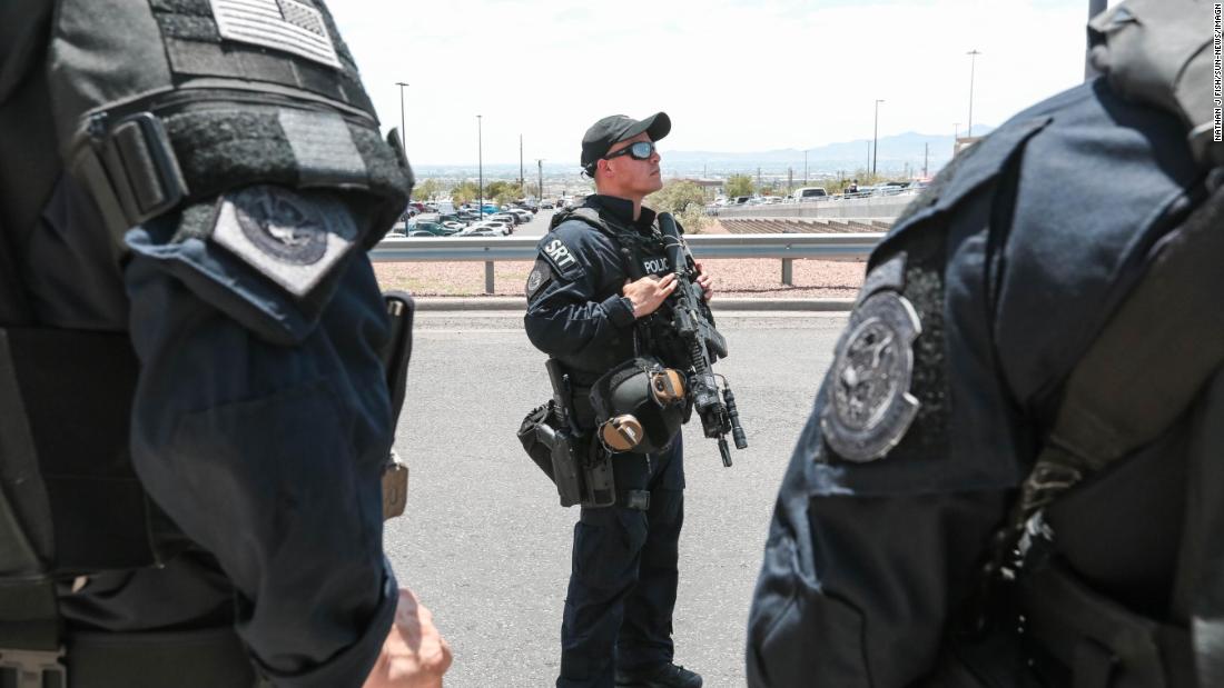 Police and law enforcement surround a Walmart in El Paso after an active shooter entered the store and opened fire on Saturday. 