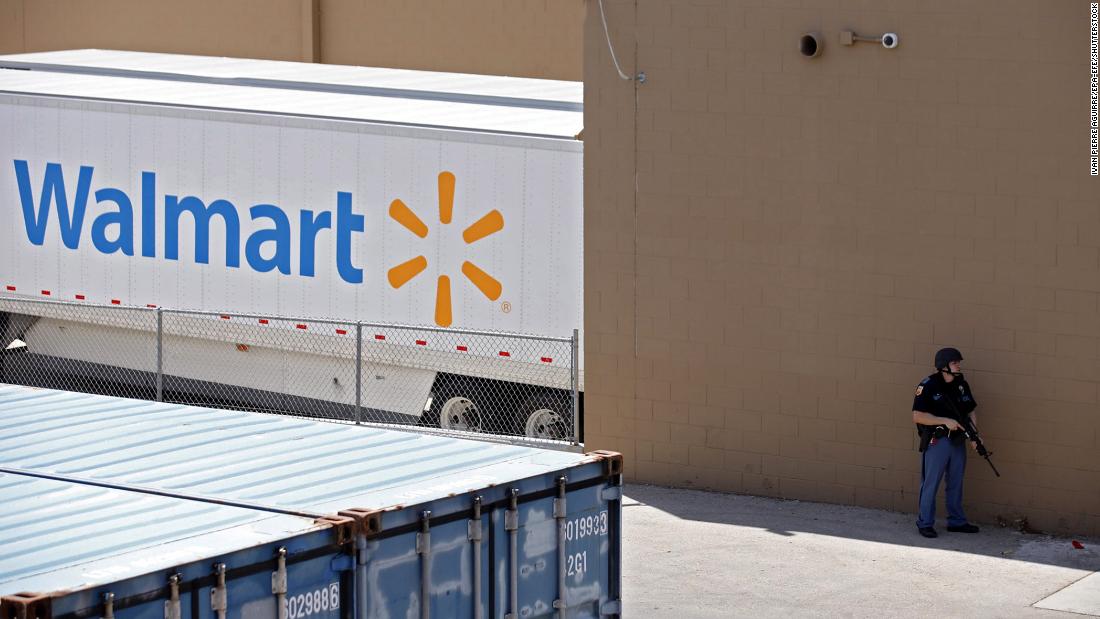 A law enforcement officer stands outside the El Paso Walmart.