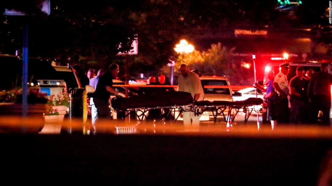 Bodies are removed from the scene of the mass shooting in Dayton.