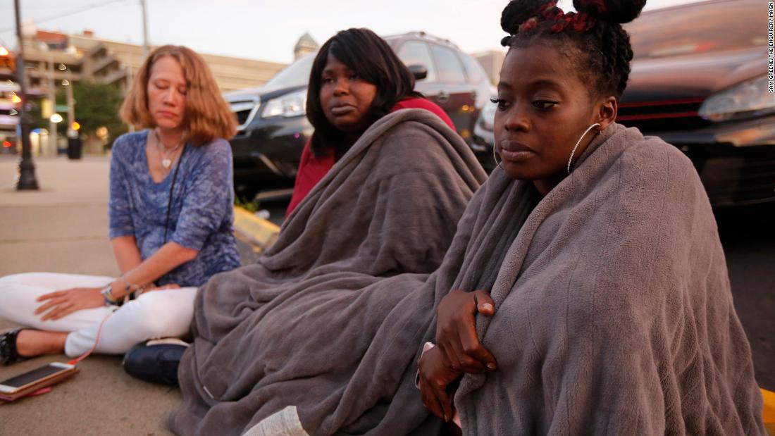 From left, Tiffany McConnell, Tanycia Leonard and Nikita Papillion recall their night in Dayton.