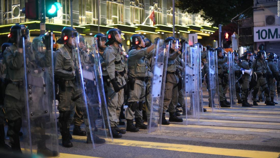 Riot police block streets on the northwestern side of Hong Kong Island on August 4, 2019.