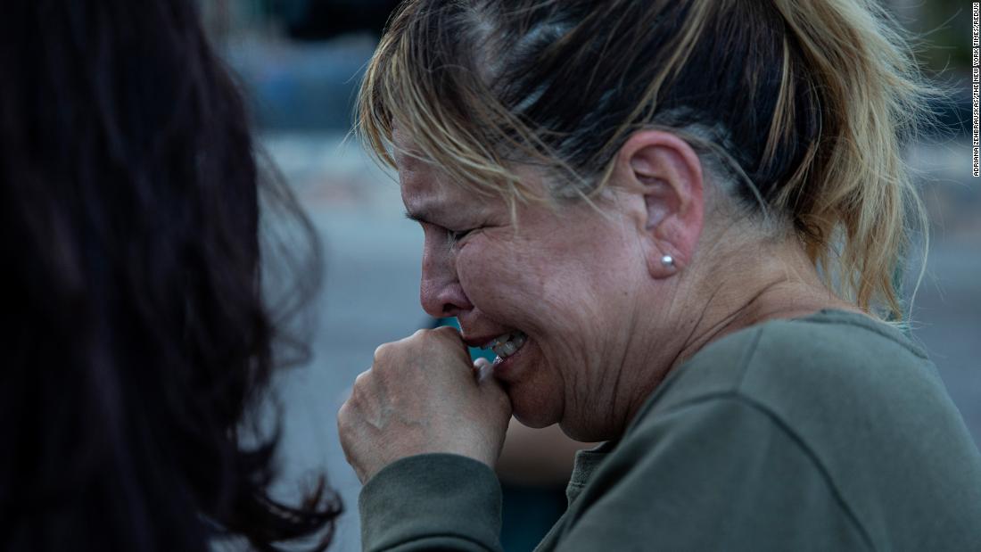 Edie Hallberg speaks to reporters near the site of the El Paso Walmart where people were killed Saturday. Hallberg's mother, Angie Englisbee, was killed in the shooting.